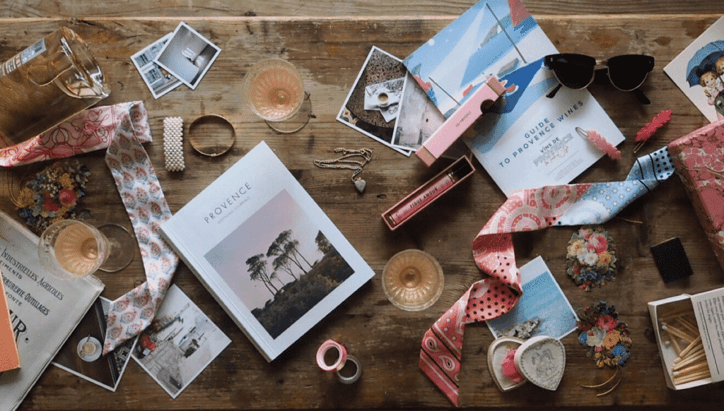 Colourful items on a wooden table.