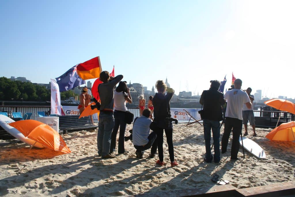 People enjoying a beach event outdoors.