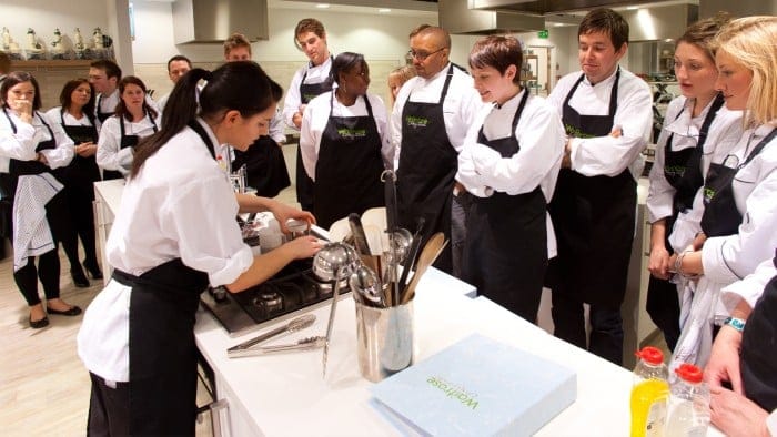 Cooking class with attentive participants watching